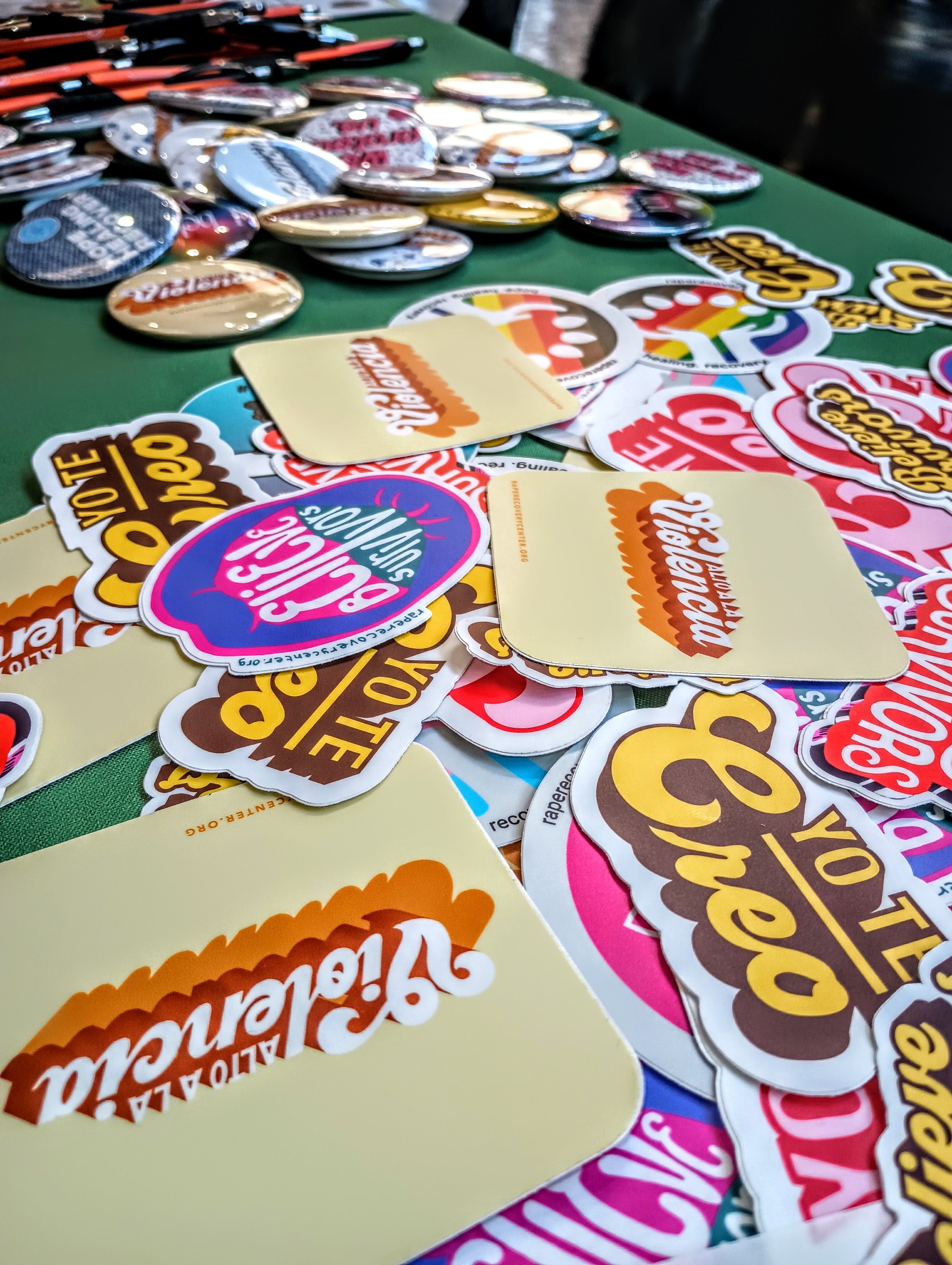 Stickers with words and phrases about sexual assault education and awareness.